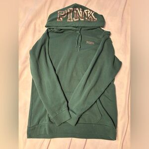 green hoodie/ pink brand